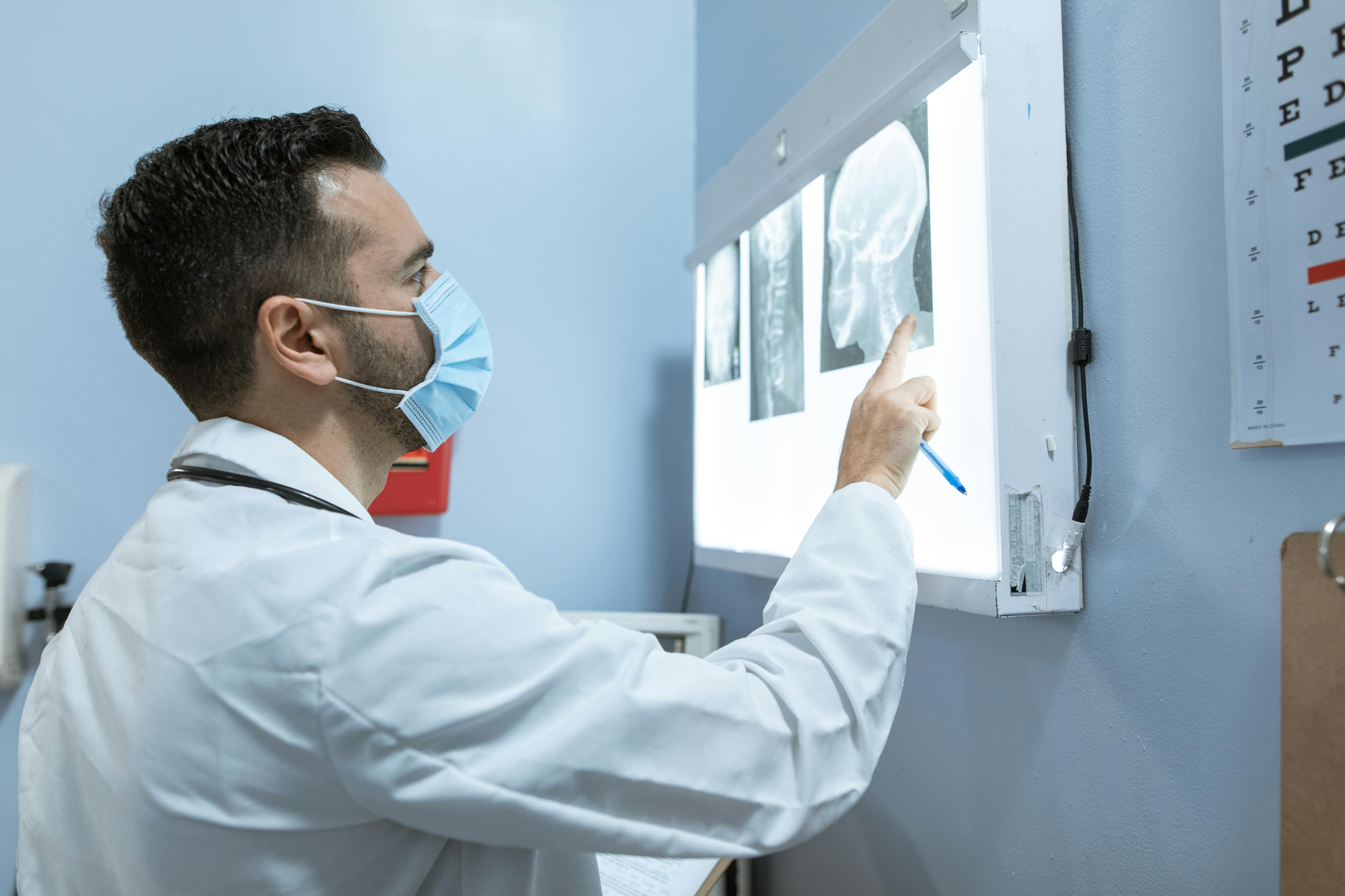 Neurologist Analyzing Brain Scans